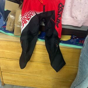 ANSR Red and Black Racing Pants brand new Y24